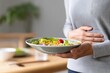 © jack - Stomachache digestion healthy food discomfort plate pain nutrition for wellness, vegetable meal, abdominal symptom, disease prevention, and dietary relief concepts at home
