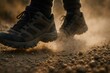 © Татьяна Евдокимова - Hiking boots kicking up dust while traversing a gravel path during a stunning sunset, capturing the essence of outdoor adventure and exploration