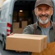 © Iurii - Delivery driver smiles while handing over a package in front of a delivery van