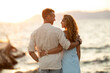 © milanmarkovic78 - Couple In A Hug Enjoying A Sunset At The Beach