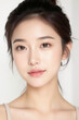 © Eggy - Female Asian Model with Short Hair - Young Beautiful Woman with Hair Bun - Studio Portrait of Asian Beauty for Fashion, Cosmetic, Skincare - Posing on White Background - Smooth Tied Hair