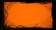 © MR BAT - An orange halloween background with a black border of spiderwebs and thorny vines for text overlay