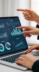 Wall Mural - close-up of hands interacting with laptop displaying graphs and charts, showcasing data analysis and