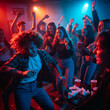 © flucas - Group of people are dancing and having fun at a party