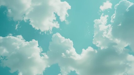 Wall Mural - a small plane soaring through a bright blue sky filled with clouds, suitable for use in travel or ad
