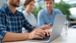 © Kateryna - Web Designers Collaborating on an Online Marketing Project with Laptop