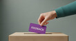 © creative - Hand putting feedback card in box symbolizing customer review, survey response, and constructive evaluation
