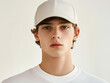 © Iffatjahan - Young man with light brown hair wearing a light beige baseball cap male portrait