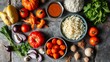 © nicole - Top-down arrangement of vibrant Asian food ingredients on a rustic stone surface, showcasing Vietnamese and Thai cuisine.