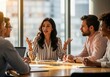 © SHAPLA - Diverse team collaborating in a modern office meeting room