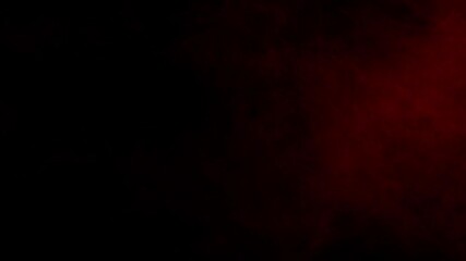 Wall Mural - red mist fog or smoke swirls and flows slowly on a black background. ideal overlay for bloody horror