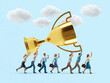 © SS30 - A miniature business team works together to carry a giant golden trophy, symbolizing collective effort and collaboration to achieve a major goal.