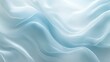 © sablengjago - Abstract light blue silk fabric waves texture background.