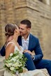 © bnenin - Romantic Wedding Couple Sharing a Special Moment with Affection and Love