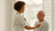 © Monkey Business - Female Nurse Wearing Uniform Listening To Senior Male Patient's Chest In Private Hospital Room