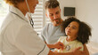 © Monkey Business - Nurse Wearing Uniform Listening To Girl Patient's Chest With Stethoscope In Private Hospital Room