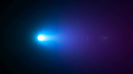 Wall Mural - bright blue and purple light beams from side to center in darkness. stage spotlight glow on black ba