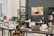 © TrueFrame Collective - No people wide interior shot of modern office equipped with minimalistic furniture and laptops, copy space