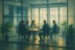 © Rowshan - Business meeting in a modern glass conference room with silhouetted figures