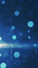 Poster - soft blue bokeh lights with a bright horizontal flare on a dark background, evoking a cinematic look