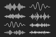 © Jannes - Audio waveform vector set, sound wave elements, music equalizer shapes, abstract white waveforms, song track amplitude graphics, black background, voice and radio signal spectrum lines