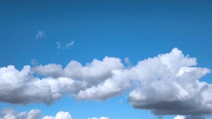 Wall Mural - cumulonimbus clouds with plenty of light move in a celestial landscape