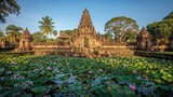 Saraswati temple basking in sunlight amidst greenery