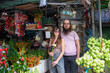 © Studio KME/Stocksy - Couple Posing Together at a Vietnamese Flower Market