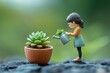 ©  prophotolibrary - A miniature girl gently waters a succulent plant in a small terracotta pot, showcasing a scene of nurturing growth.