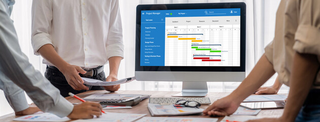 Wall Mural - project planning software for brisk business project management on the computer screen showing timel