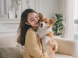 © Adobe Contributor - Asian Woman Affectionately Holding a Pembroke Welsh Corgi