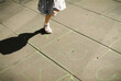 © Ayuna Production/Stocksy - Child playing hopscotch