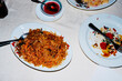 © Juan Moyano/Stocksy - chinese dishes on a restaurant table