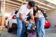 © Christine La/Stocksy - family car
