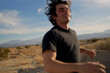 © Studio Sincère/Stocksy - Man running in Desert Landscape During Golden Hour