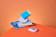 © Marc Tran/Stocksy - A vibrant display of office supplies, arranged in a playful stack