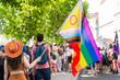 © Luis Velasco/Stocksy - Pride Parade With Inclusive Flag