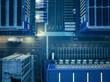 © ma yic/Stocksy - Warehouse and Truck Logistics Aerial View at Night