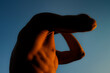 © Ivan Andrianov/Stocksy - Emotional Male Person in Dramatic Evening Light