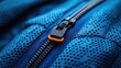 © roman - Macro of blue sportswear zipper - Shallow depth detail shot for athletic fashion and commercial use