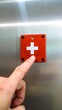 © oky - Finger presses red emergency button