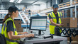 © Gorodenkoff - Caucasian Female Stocking Associate Using Desktop Computer To Check Inventory In Modern Distribution Facility. Multiethnic Colleague Loading Cardboard Boxes With Orders On Automated Conveyor Belt