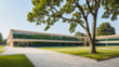 © Adi - blurry photo of a modern school building with lots of trees around, bright atmosphere without any people, blurry school wallpaper.