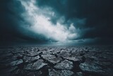 A cracked earth landscape under a stormy sky (1)