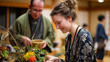 © Kristina - A student learning ikebana in a traditional class setting with an instructor