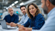 © Kateryna - Diverse Engineering Team Collaborates in High-Tech Factory Meeting Room