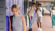 © Monkey Business - Unhappy Female High School Or Secondary Student Being Teased And Bullied By Boys Outdoor Lockers