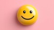© benjamas - Bright Yellow Smiley Face Icon on a Soft Pink Background Evoking Happiness and Positivity