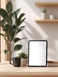 © FachAI - Minimalist workspace tablet, mug, succulent, and a book rest on a light wood desk;  sunlit room with a plant and shelves