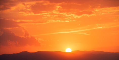 Wall Mural - beautiful sunset over the lake and mountains.